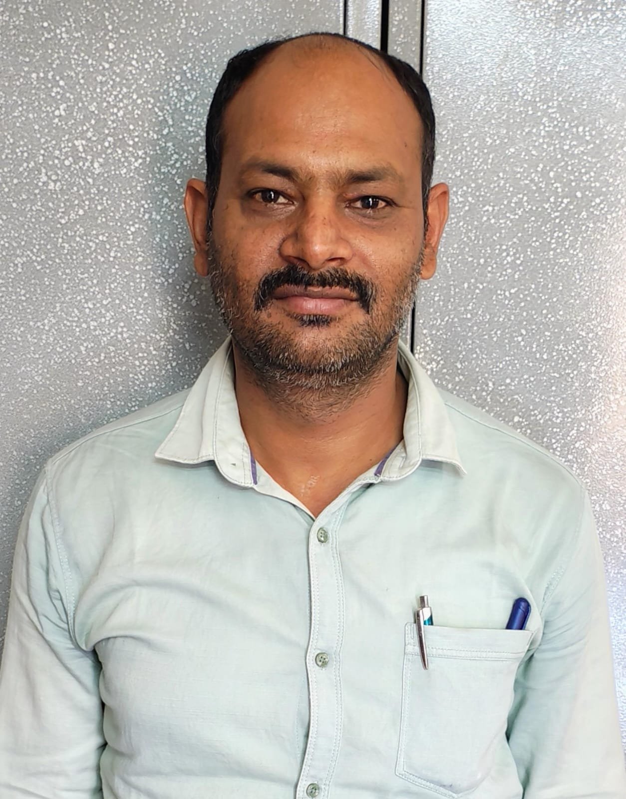 Dr. Naveen Singh Rajput